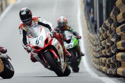 Gary Johnson riding the AIM Suzuki at Macau