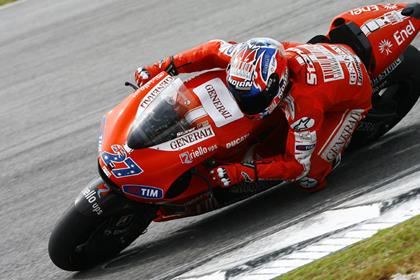 Casey Stoner set the fastest time despite a late crash