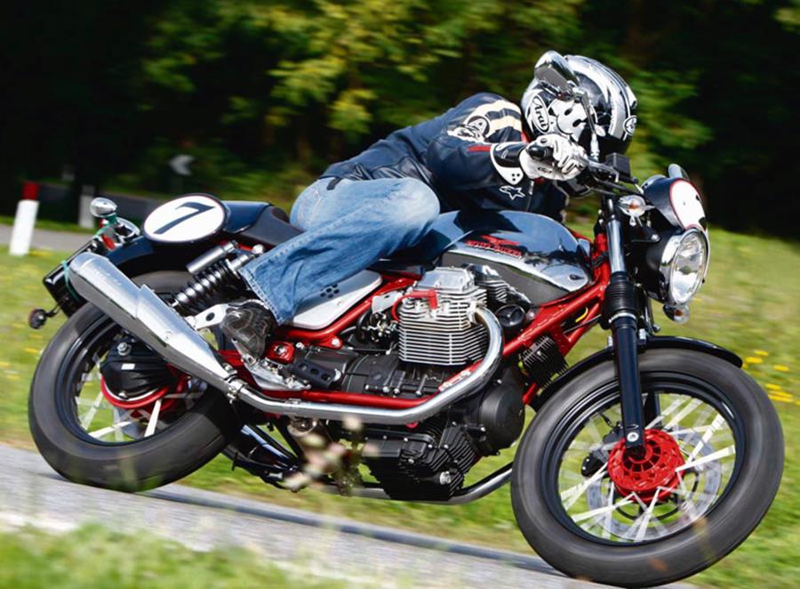 Moto Guzzi V7 Racer leaning into a left hand bend