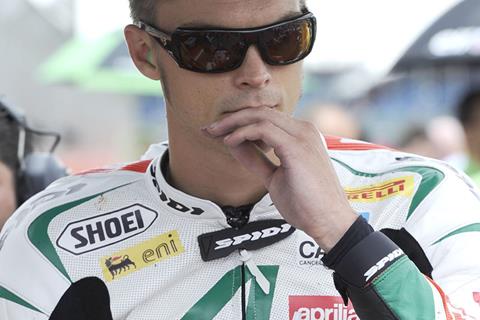 Camier stays with Aprilia for 2011, but will miss Imola race