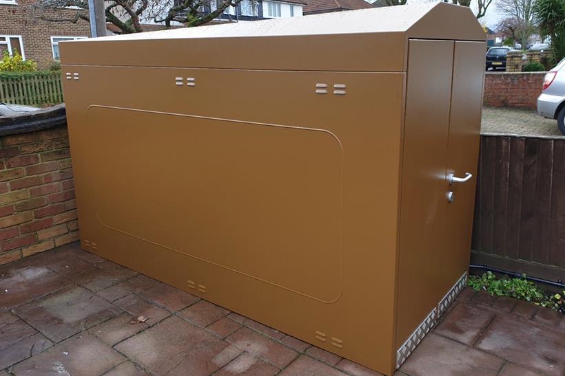 Outdoor motorcycle shelter assembled at someone's home