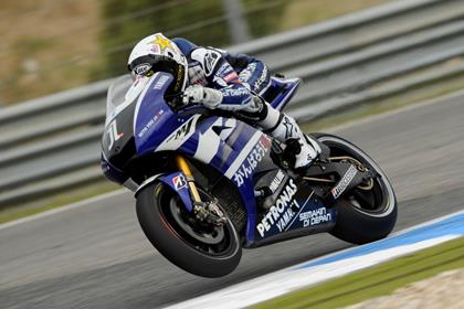 Lorenzo takes pole at Estoril