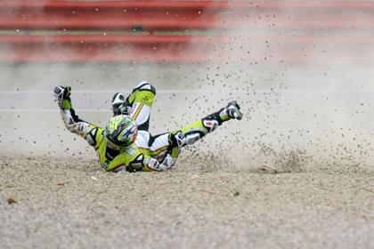 Capirossi broke two ribs and dislocated his right shoulder in Assen 