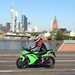 Kawasaki Ninja 300 on a bridge ridden in leathers