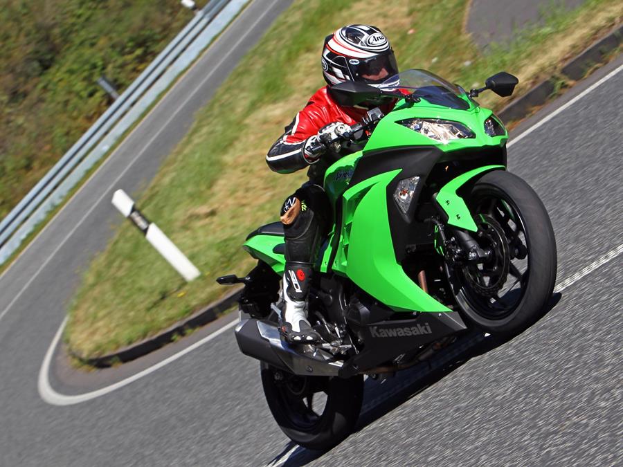 300 Kawasaki Ninja ridden at speed through a corner