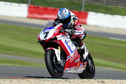 Checa secures race one win