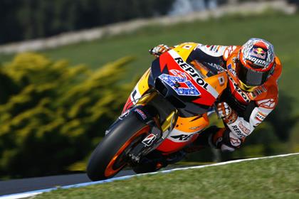 Casey Stoner storms to home pole position 