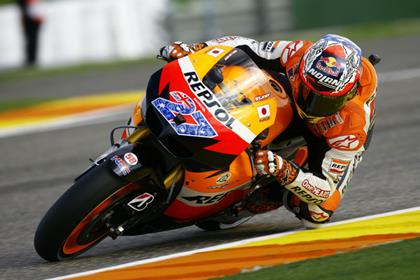 Stoner secures twelfth pole of season at Valencia