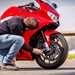 Gareth Evans looking at the Honda VFR800F front wheel