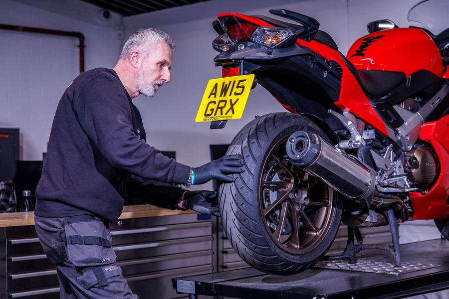 The standard mainstand is a very helpful feature for maintenance on the Honda VFR800F. 