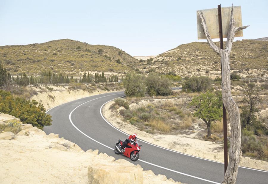 Honda VFR 800 VTEC ridden quickly around a lovely mountain corner