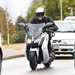 BMW C evolution in traffic demonstrating its skills as an electric commuter bike