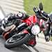 Ducati Monster 1200 R cornering on track fast