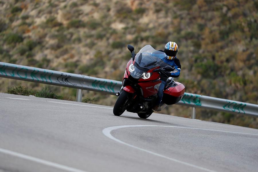 BMW K1600GT wide crop cornering in red