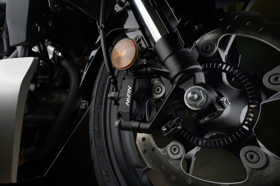 The Honda CB125R front brake lacks bite