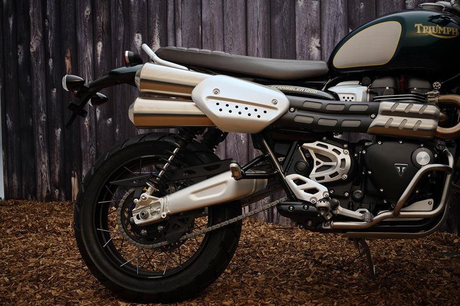 The Triumph Scrambler 1200 Steve McQueen edition exhaust and rear wheel