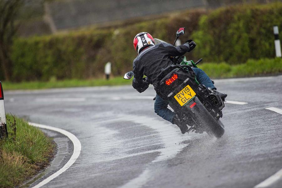 Senior Writer Dan Sutherland corners in the wet