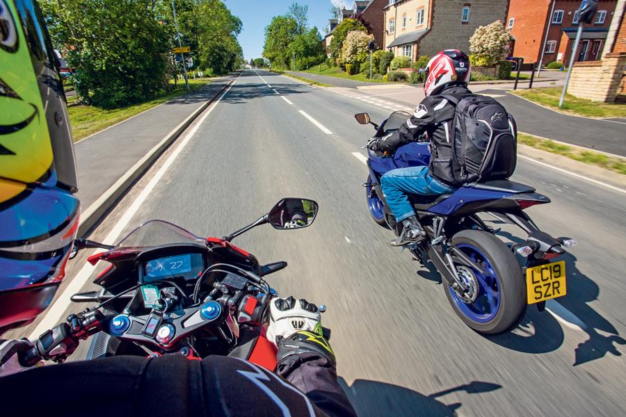 Riding the Honda CBR500R alongside the Yamaha R3