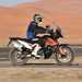 KTM 790 Adventure side profile on desert with dust