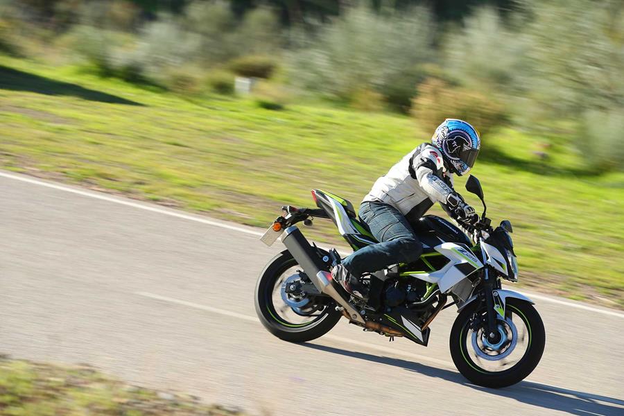 2019 Kawasaki Z125 riding past