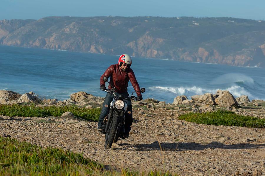 Triumph Street Scrambler being ridden off road