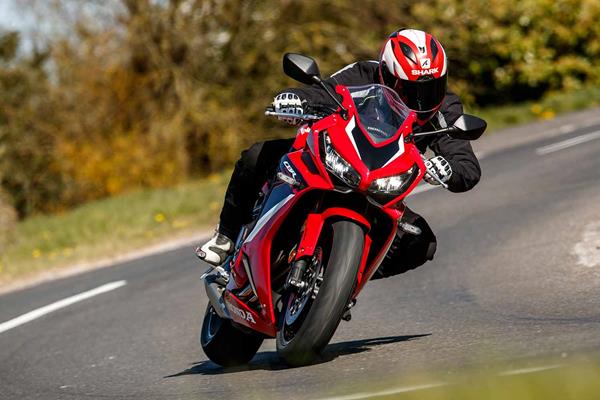 Honda CBR650R left-hand turn on the road