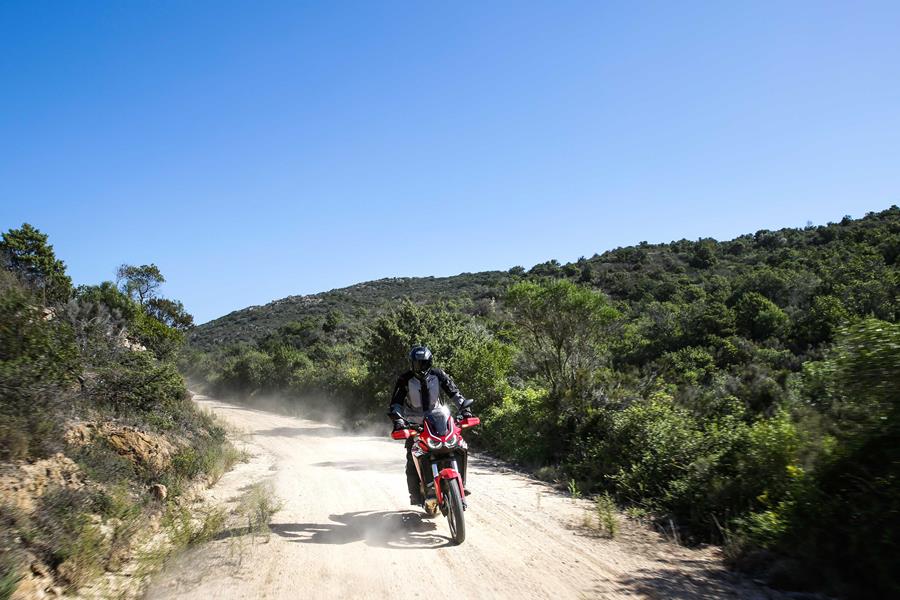 Riding the Africa Twin on a light trail