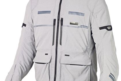 The Macna Night-Eye Concrete jacket appears bright white in headlights