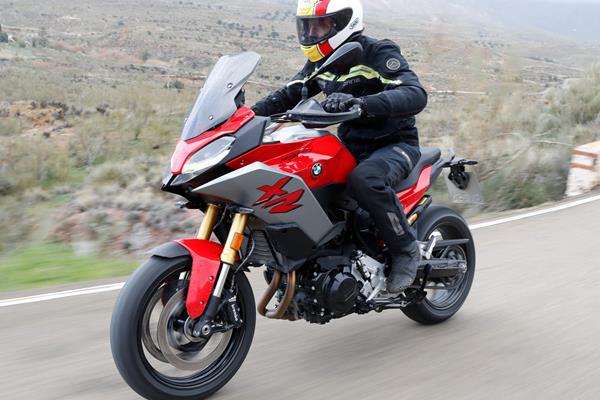 BMW F900XR riding shot straight line