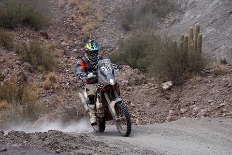 Dakar Brit Chris Cork battles on despite losing tyre and police intervention