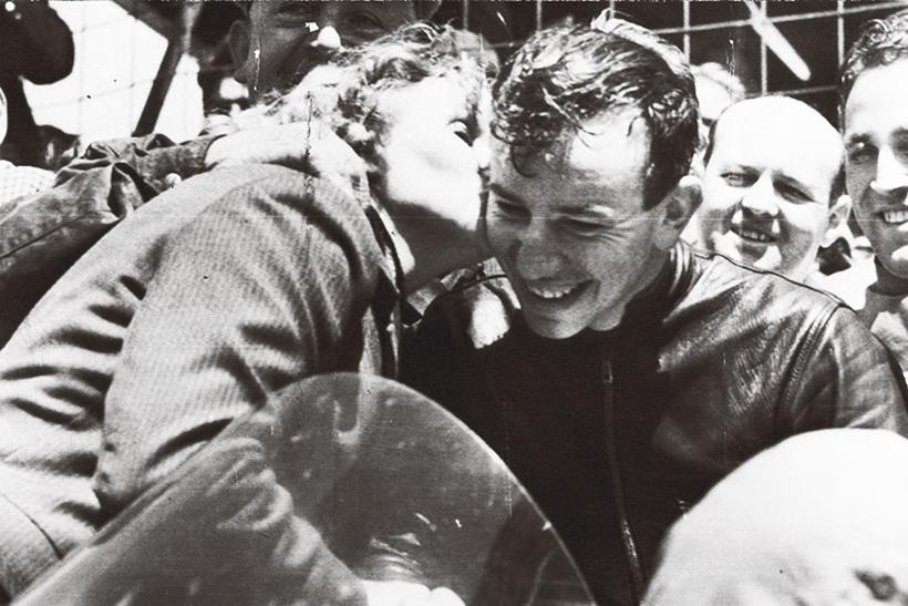 John Surtees gets a kiss from his mother after his first TT win