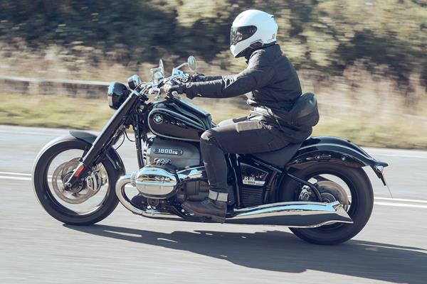 BMW R18 First Edition riding shot from side on