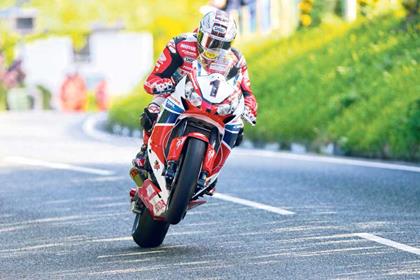 John McGuinness made his TT debut in 1996.