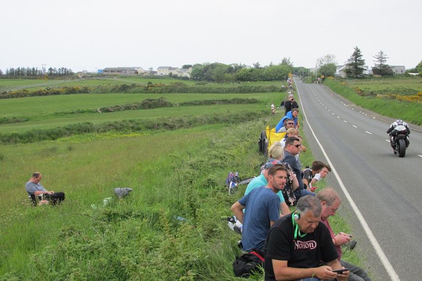 Race bikes screaming past can't stop some people turning it into Cronk-y-Noddy (left)