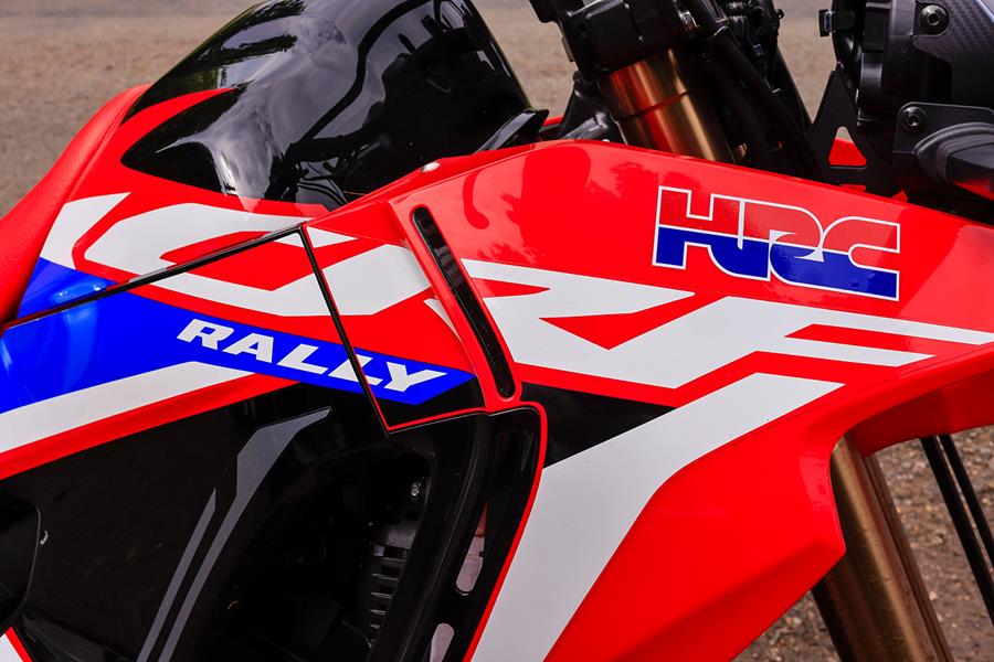 The Honda CRF300 Rally is finished in a striking red paint job