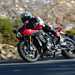 Triumph Speed Triple 1200 RR on the road turning right
