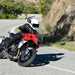 2022 Triumph Tiger Sport 660 on the road turning left