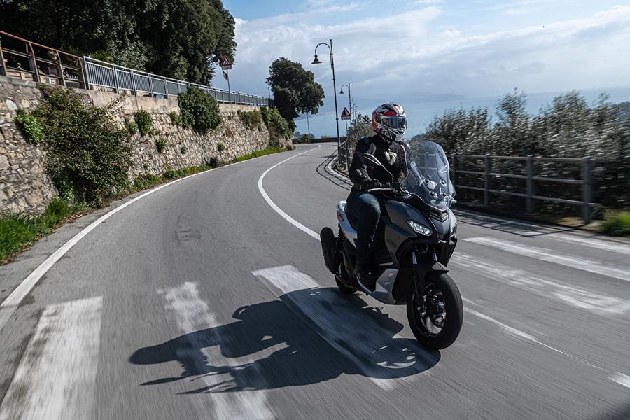 Aprilia SR GT 125 on zebra crossing