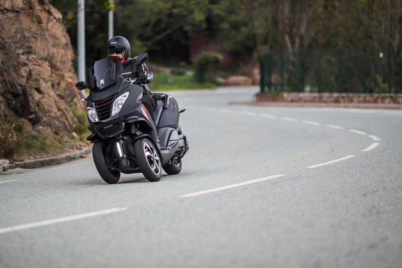 Peugeot Metropolis is a scooter with three wheels