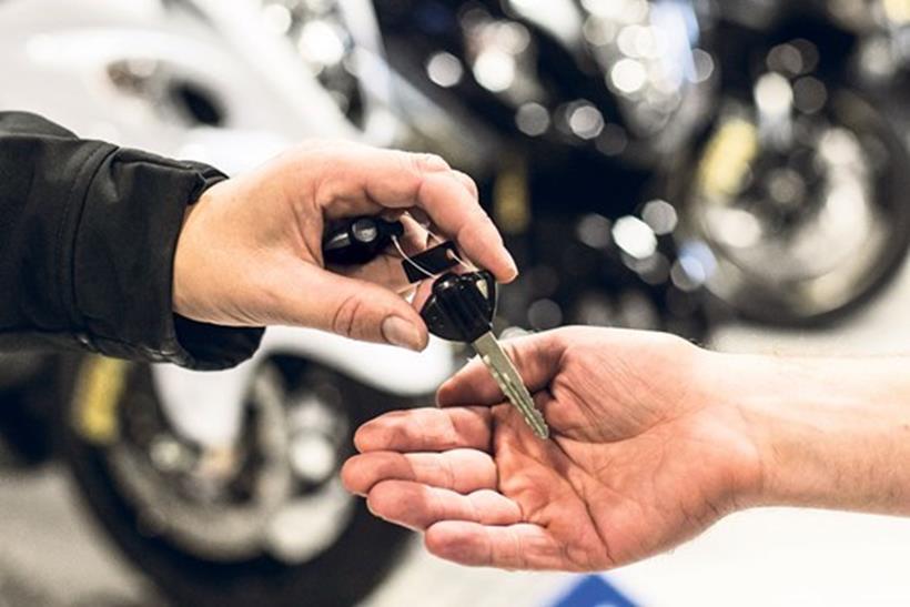 Motorcycle keys change hands