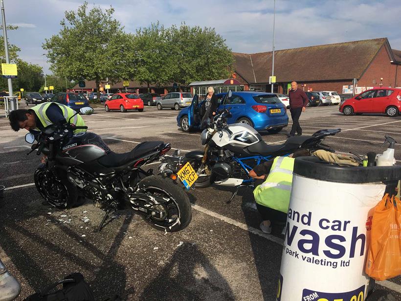 Both bikes getting a well-earned clean