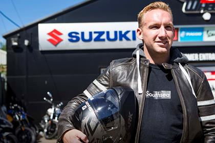 BMX freestyle athlete Declan Brooks outside a Suzuki dealer 