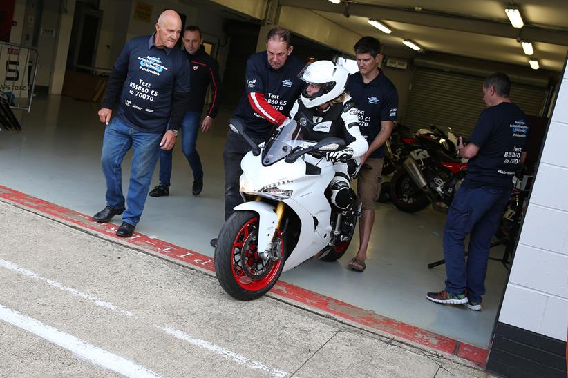 Claire Lomas heads out onto pit lane