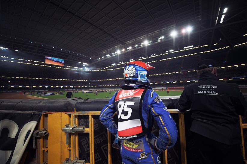 Polish rider Bartosz Zmarzlik with a marshal (photo credit: SpeedwayGP)