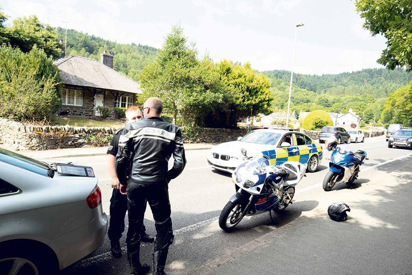 A Suzuki GSX-R 750 SRAD is pulled over