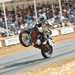 MCN's Michael Neeves popping a wheelie at Goodwood