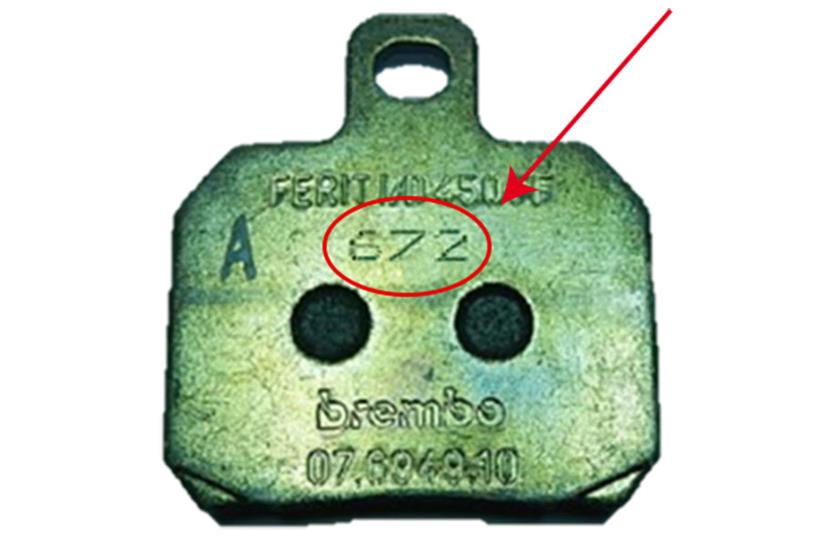 The affected brake pads have the number '672' etched on them