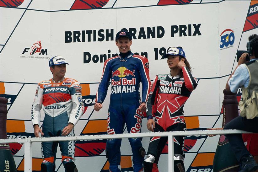 Simon Crafar stands on the top step of the podium at Donington Park in 1998