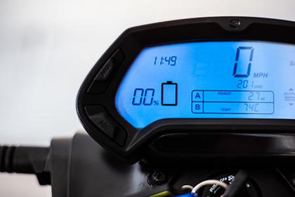 Electric motorcycle dash showing charge level