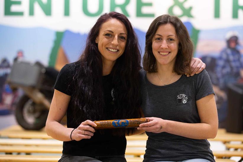 Hayley and Sara pose with the baton